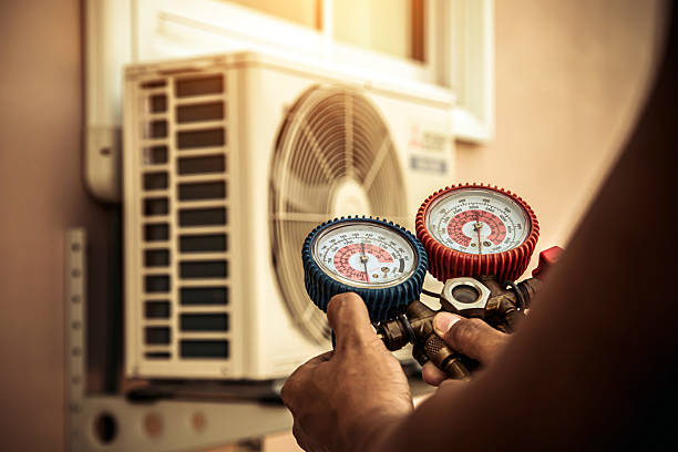 Professional Heat Pump Repair technician working in Deerfield, MI